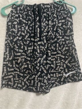 Nike Black Shorts with White "Just Do It" Allover Print
